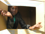 Mereille in a box house