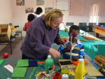 Friend of Preca Community helping with the craft class on Friday nights